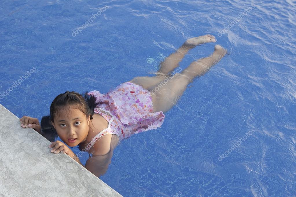 Asian girl swimming